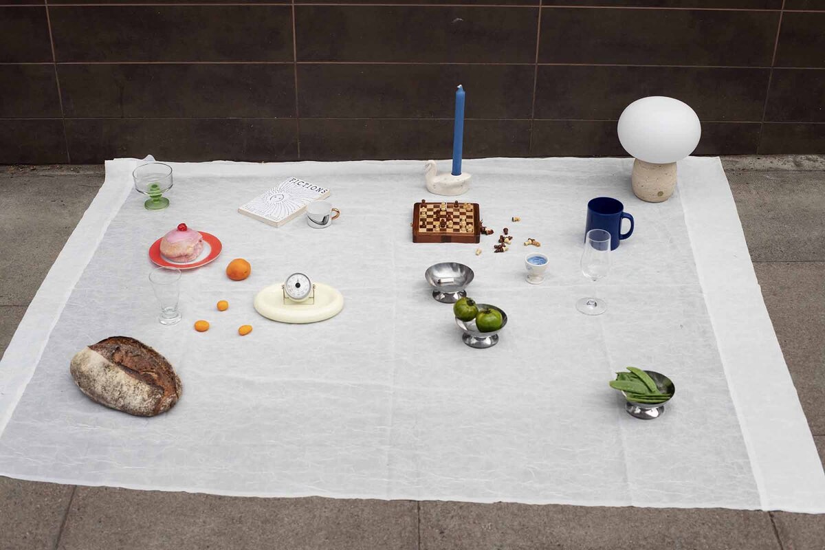 A picnic on the pavement in front of a solicitor's office.